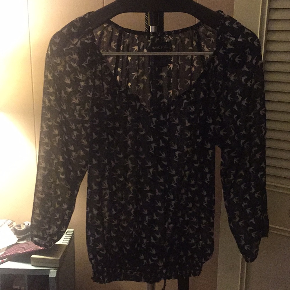 Blue blouse with white birds
